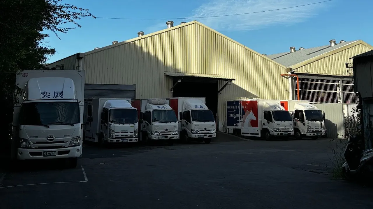 Yi Zhan Logistics trucks at its warehouse